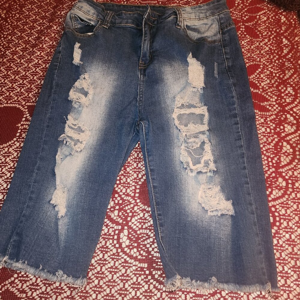 Medium blue ripped jean shorts